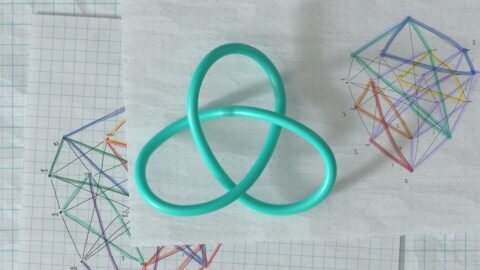 Pure mathematics Year 13 image showing graph paper with geometric graphs, knot theory loop, and 3D geometric structure using colorful lines